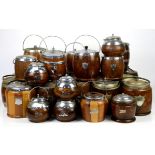 A large collection of 20th century treen wooden biscuit barrels and tea caddies of barrel form,