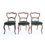 Set of six Victorian rosewood dining chairs, with pierced and shaped backrests, on cabriole legs (6)