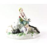 Meissen porcelain figural group, 'The Spring', depicting a goatherd and a young girl on a rocky