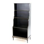 20th century ebonised waterfall bookcase with four shelves, with gilt painted fruit and leaves to