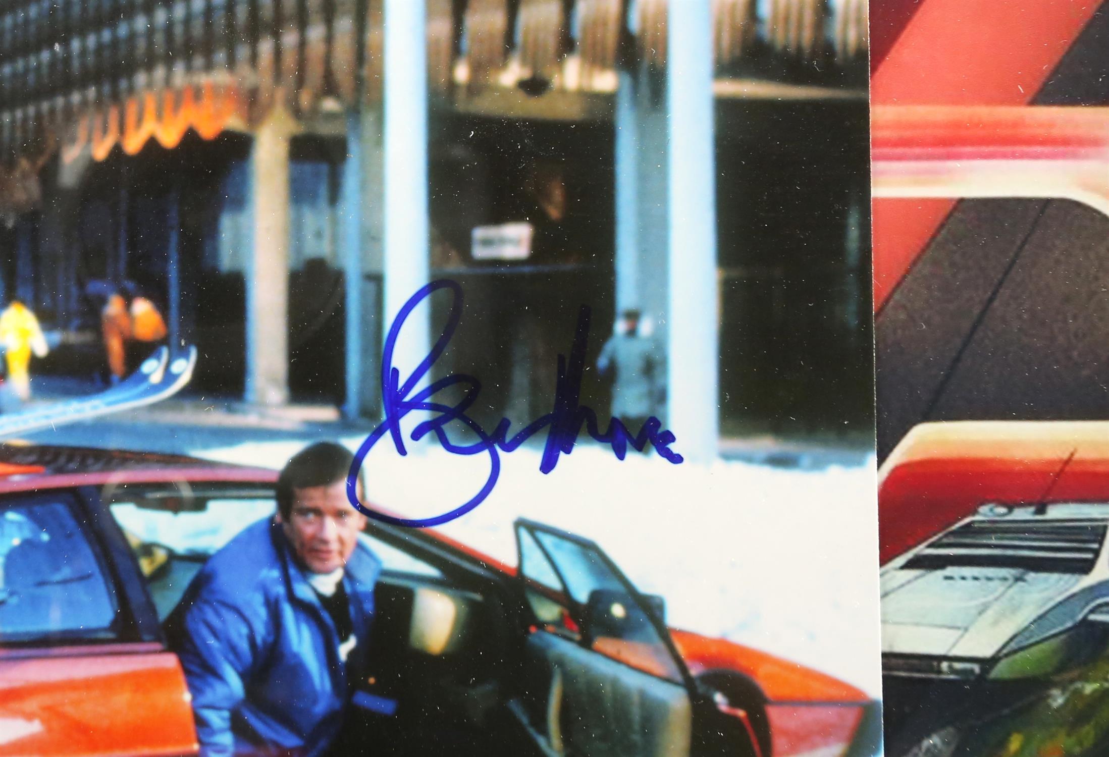 James Bond - Roger Moore signed photograph, framed, 13 x 9 1/2 inches overall. - Image 2 of 2