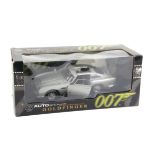 James Bond 007 - An Autoart 1:18 scale Aston Martin DB5, modelled on the vehicle in the film