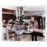 James Bond - Roger Moore signed 10 x 8 inch photograph.