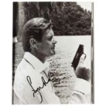 James Bond - Roger Moore signed 8 x 10 inch photograph.