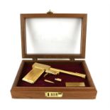 James Bond The Man With The Golden Gun - A replica golden gun, 24 karat gold-plated replica