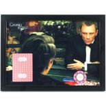 AMENDED DESCRIPTION - James Bond Casino Royale (2006) A $25,000 poker chip and playing card,