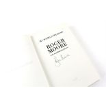 James Bond - Roger Moore signed hardback copy of 'My Word Is My Bond'.