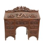 Early 20th century Chinese hardwood bureau, with raised back, over fall front enclosing drawers and