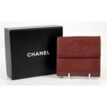 Chanel caviar leather bifold purse wallet in deep red lined in grosgrain fabric, with box and id.