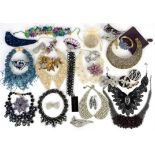 A group of costume jewellery and peter pan collar necklaces, compacts, Butler and Wilson hair clips,