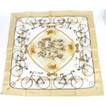 Classic Hermes scarf in creams and beige “Les Becanes” (bikes) design designed by Hugo Grygkar in