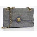 Chanel vintage quilted jersey fabric with grey leather trim flap bag, red grosgrain lining ,