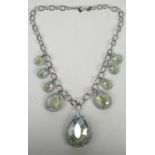 Contemporary Swarovski statement necklace, with large facetted pale blue drops surrounded by multi