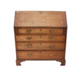 Late 19th century oak bureau, the fall front revealing fitted interior, above four graduated long
