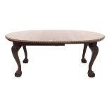 Victorian mahogany dining table, on cabriole legs and acanthus carved knees on ball and claw feet,