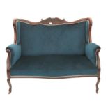 Early 20th century mahogany suite to include a sofa and two wingback armchairs, with blue