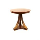 Regency style walnut centre table, with splayed supports with giltwood dolphin design,
