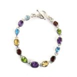 Multi-gemstone set bracelet, set with amethyst, garnets, citrine, peridot and blue topaz,