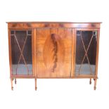 Inlaid mahogany cabinet, with two astragal glazed doors flanking a cupboard door,