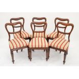 Set of six Victorian mahogany balloon back dining chairs, the drop in seats with floral upholstery