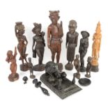 Selection of carved ebony and hardwood African and Middle Eastern figurines including an elephant