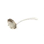 George III silver sifter ladle with crimped edges and floral pattern, London 1815