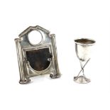 Golf club legged small trophy or egg cup, Birmingham 1924 and a silver mounted calendar and watch