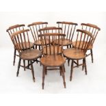 Set of eight oak spindle back chairs, on turned supports joined by stretchers