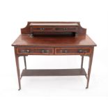 Early 20th century satinwood inlaid mahogany dressing table, with two drawers to top above two