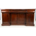 Victorian mahogany sideboard, with one long and two short frieze drawers above four cupboard doors,