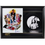 James Bond - Roger Moore autograph in framed display, 13 x 18 inches overall.
