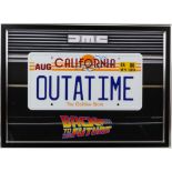 Back to the Future - Michael J Fox autographed replica Delorean license plate, in framed display,