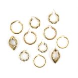 Gold earrings, including three pairs of twist hoop earrings, a single hoop earrings,