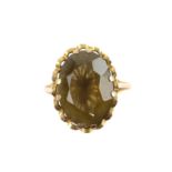Single stone citrine ring. Oval cut citrine measuring 18.36 x 13.39mm, mounted in 9 ct,