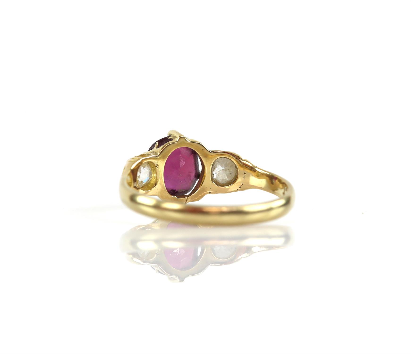 Three stone ruby and diamond ring, oval cut ruby weighing an estimated 1.45ct, with an old cut - Image 2 of 2