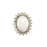 Opal and diamond ring, oval cabochon cut opal measuring 14.0 x 10.1 x 3.1mm, weighing an estimated