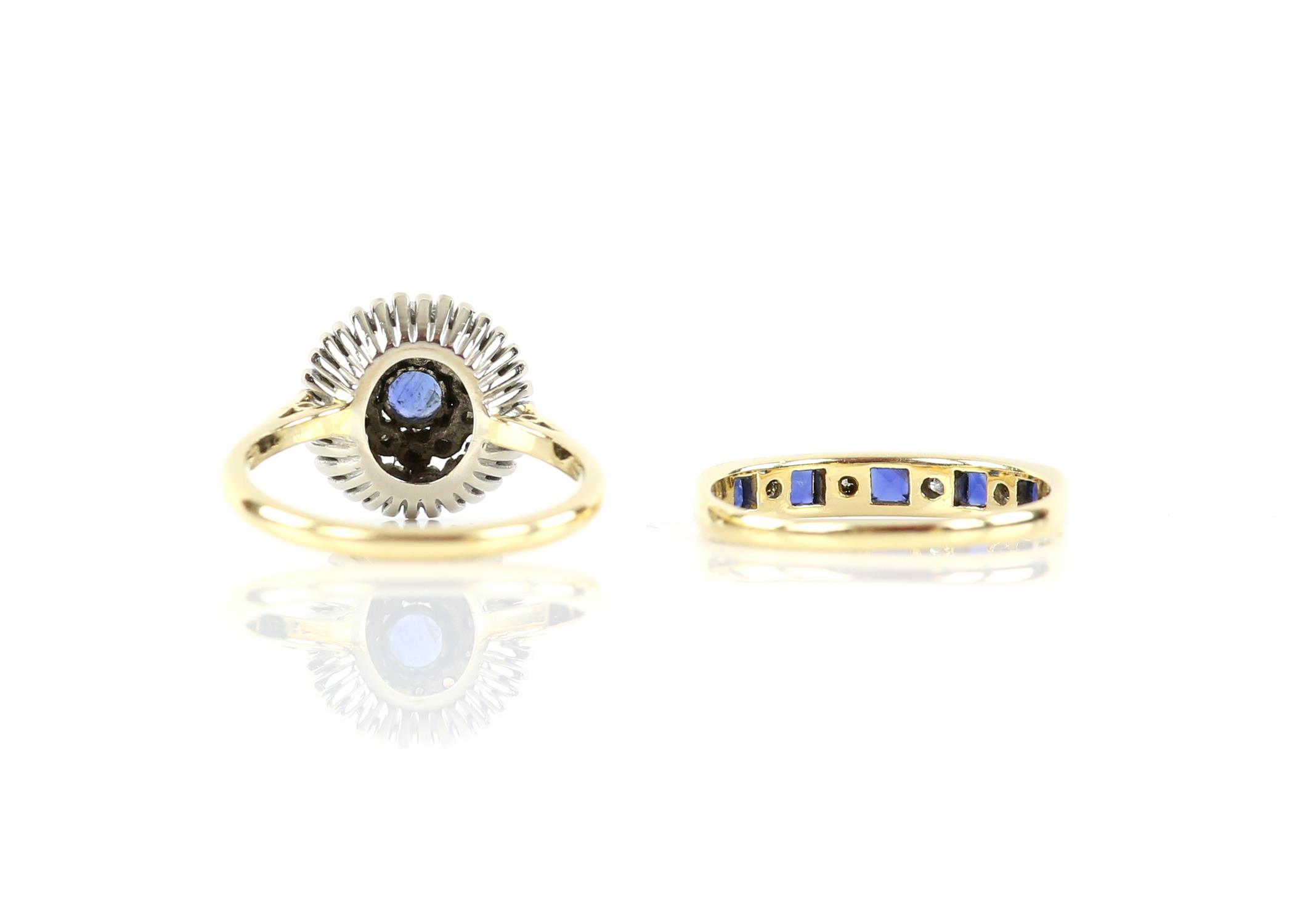 Sapphire and diamond cluster ring, centrally set with a round cut sapphire surrounded two rows of - Image 2 of 2