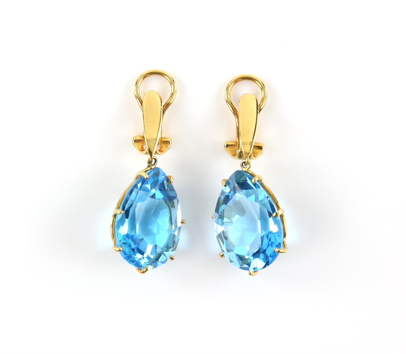 A pair of modern blue topaz drop earrings, pear cut blue topaz, weighing an estimated 25.