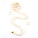 Pearl necklace, comprised of forty-seven 7.9-8.5mm cultured cream pearls, strung with knots,