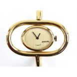 Boucher, a Ladies bangle watch, of oval outline, the brushed dial marked Boucher Swiss made,