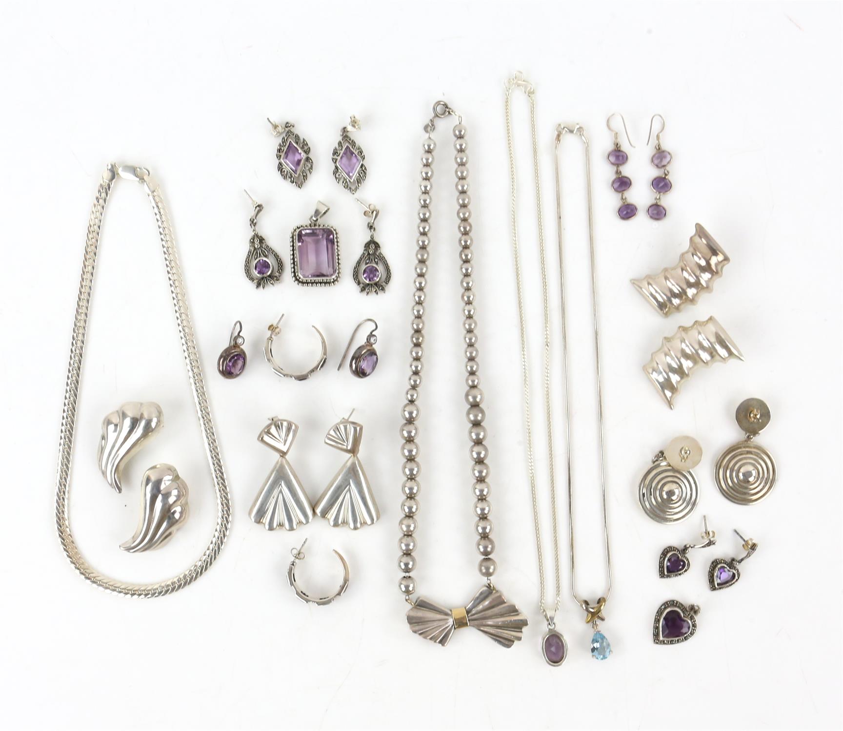 Collection of silver jewellery to include, five necklaces, two bracelets, and multiple pairs of