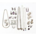 Collection of silver jewellery to include, five necklaces, two bracelets, and multiple pairs of