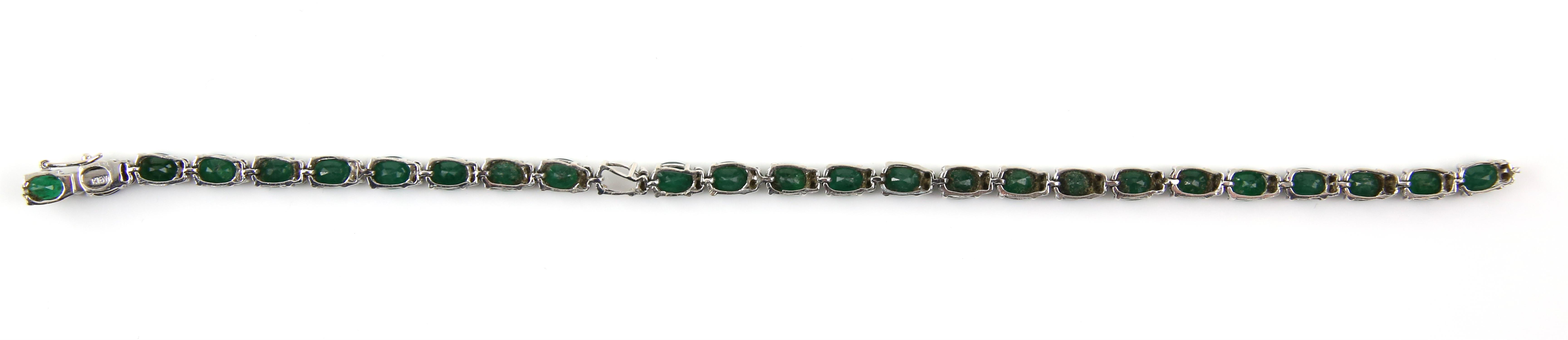 Emerald and diamond bracelet, twenty-six oval cut emeralds weighing an estimated total of 9. - Image 3 of 3