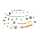 Designer costume jewellery, including a vintage Trifari floral brooch, paste set Trifari bracelets,