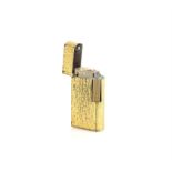 Vintage Dunhill Rollagas gold plated lighter, with a textured finish, signed Dunhill London,