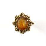 Vintage citrine ring, mixed cut citrine, measuring 12.1 x 10 mm, in a textured 9 ct mount,