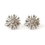 A pair of diamond star earring, set with Swiss cut diamonds, estimated total diamond weight,