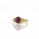 Three stone ruby and diamond ring, oval cut ruby weighing an estimated 1.45ct, with an old cut