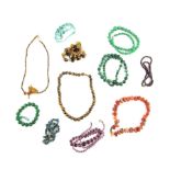 A group of gemstone necklaces to include a green quartz beaded necklace and a green quartz beaded