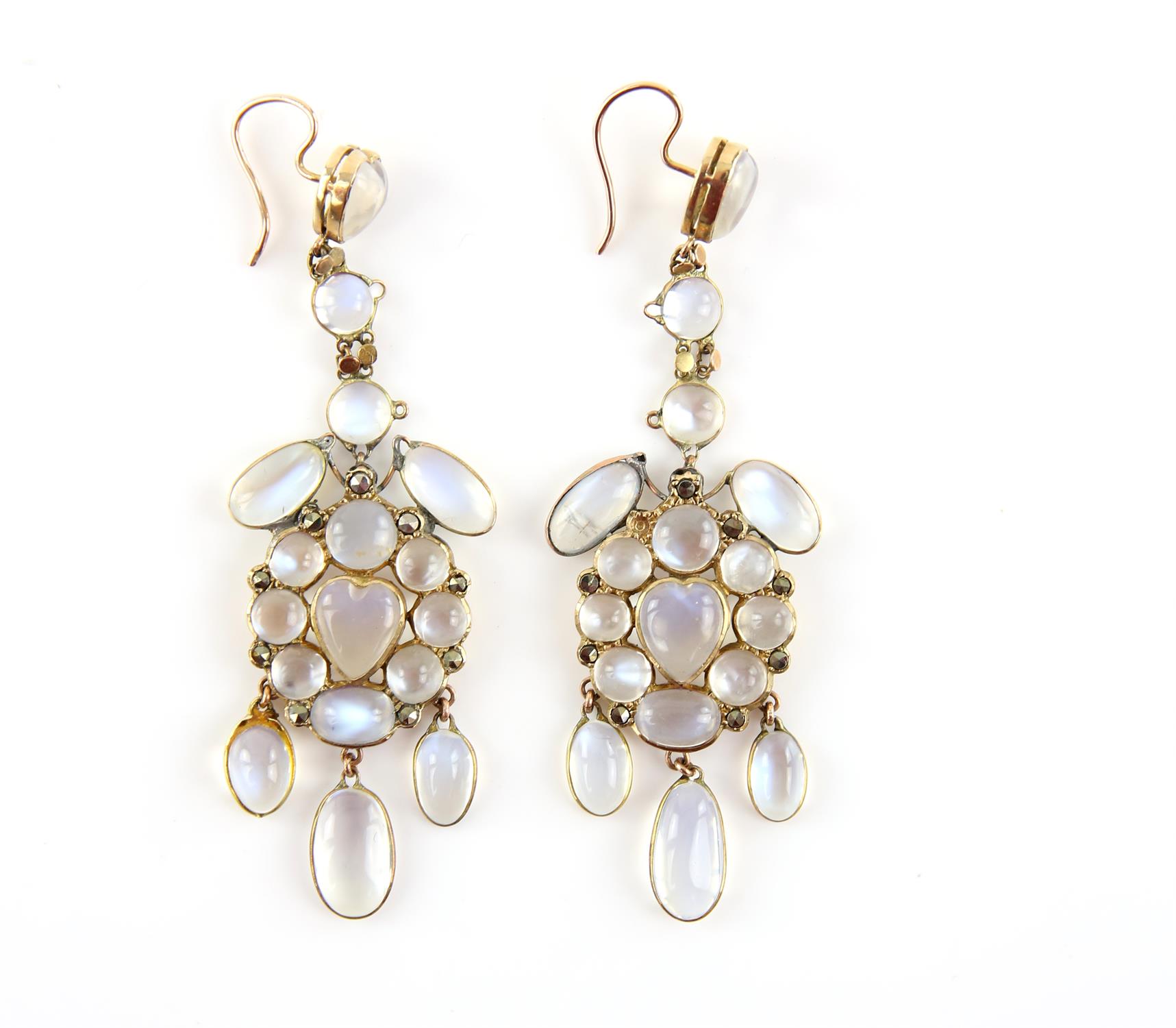 A pair of moonstone chandelier earrings, set with round, oval and heart shaped cabochon cut
